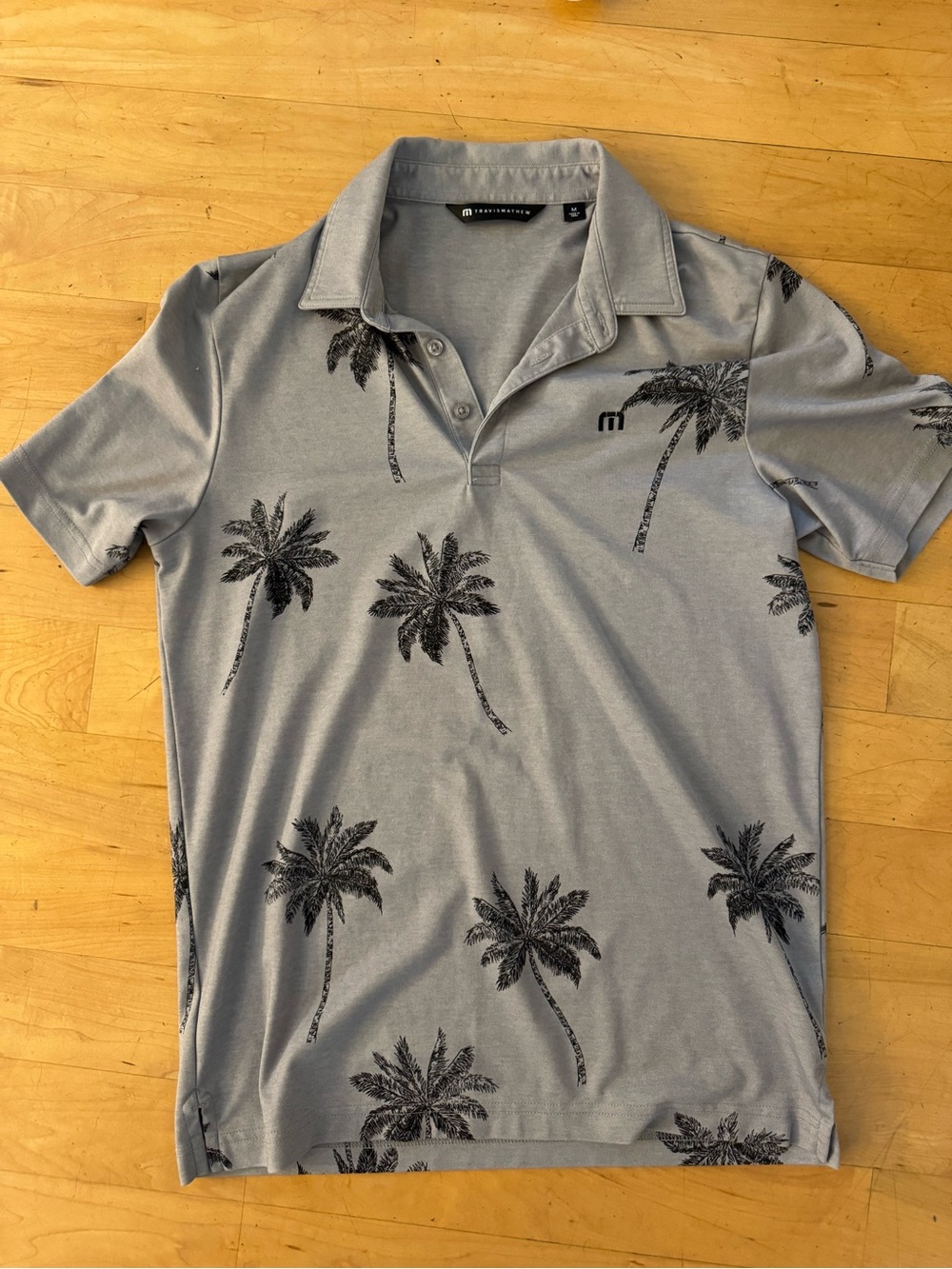 Travis Mathew Light Gray Polo with Black Palm Print